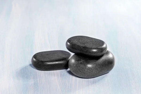 Zen stones on a wooden background — Stock Photo, Image