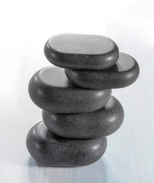 Zen stones on a wooden background — Stock Photo, Image