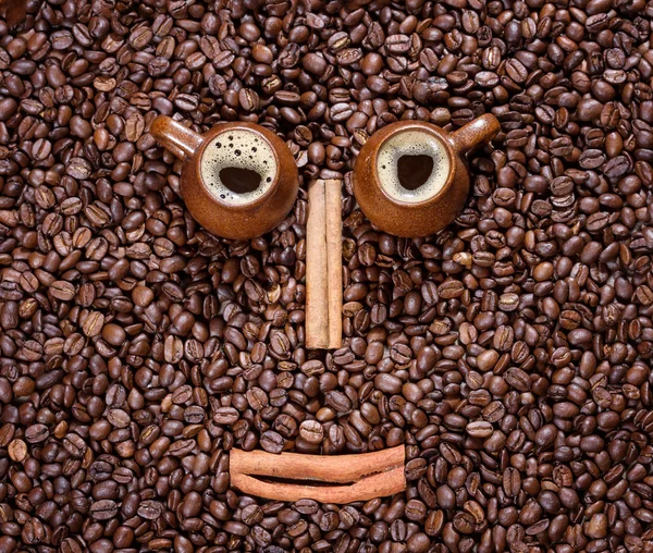 Granos de café en forma de una cara sonriente — Foto de Stock