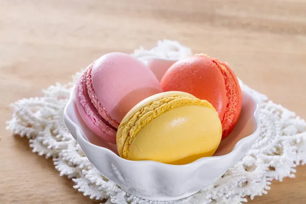 French macarons on a wooden background. — Stock Photo, Image