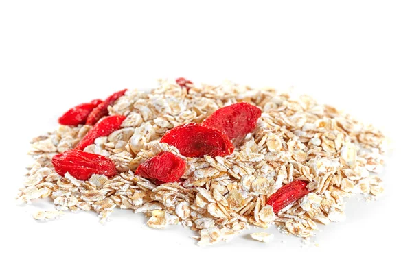 Fiocchi d'avena con bacche di goji su sfondo bianco — Foto Stock