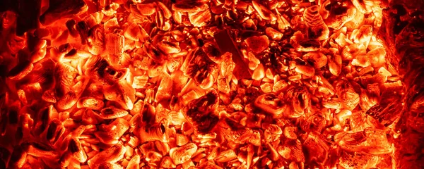 Top above overhead detail view od abstract hot red burning wooden coal background in bbq grill brazier or firepit at dark night time. Beautiful inferno heat sparks glowing flaming at hearth stove — Stock Photo, Image