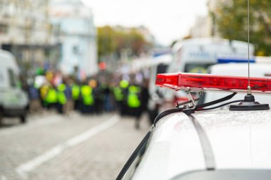Flashing lights of the police car on a city street.