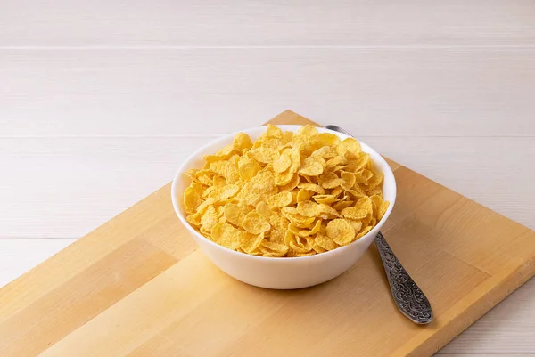 Cornflakes Mit Milch Schüssel Auf Dem Tisch Nahaufnahme — Stockfoto