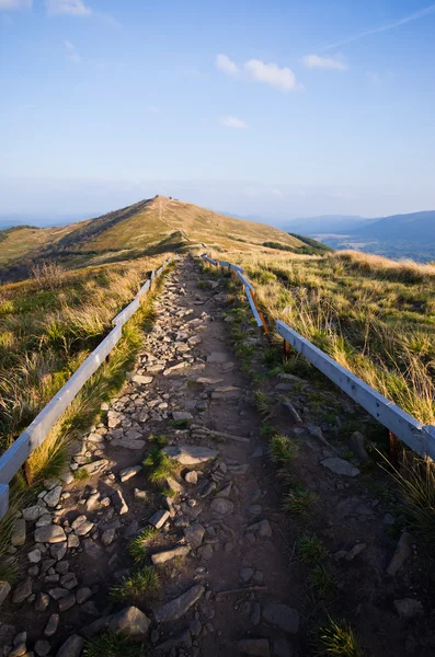 Stony road in mountains — Stock Photo, Image