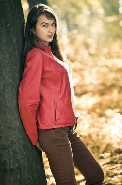 Young pretty woman in red jacket — Stock Photo, Image