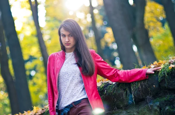 Young pretty woman in red jacket — Stock Photo, Image