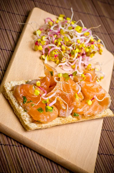 Sandwich with gravlax salmon — Stock Photo, Image