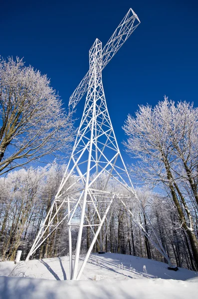 Metalen kruis op de sleza berg in de buurt van walbrzych — Stockfoto