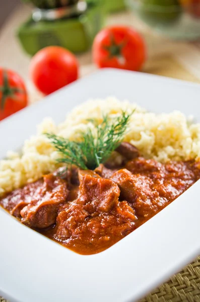 Tomato curry with couscous — Stock Photo, Image