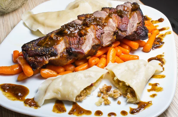 Duck (goose) breast with buckwheat dumplings and carrot — Stock Photo, Image