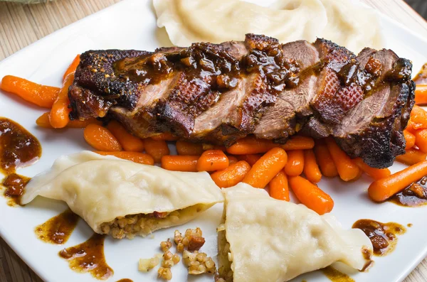 Duck (goose) breast with buckwheat dumplings and carrot — Stock Photo, Image