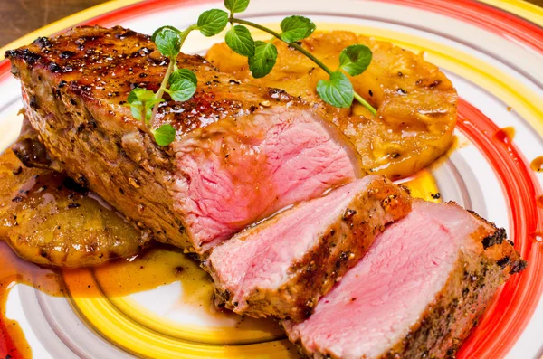 Beef steak with pineapples — Stock Photo, Image