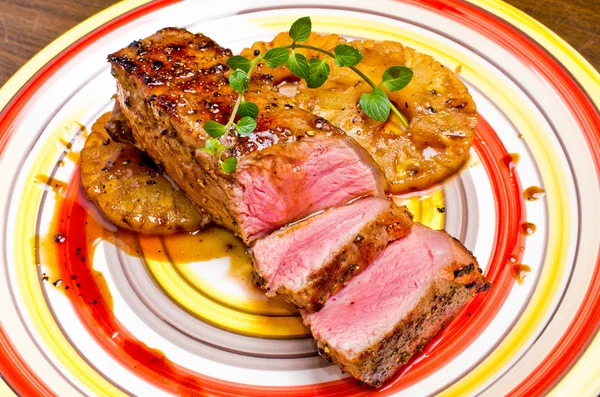 Beef steak with pineapples — Stock Photo, Image