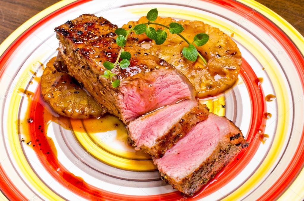 Beef steak with pineapples