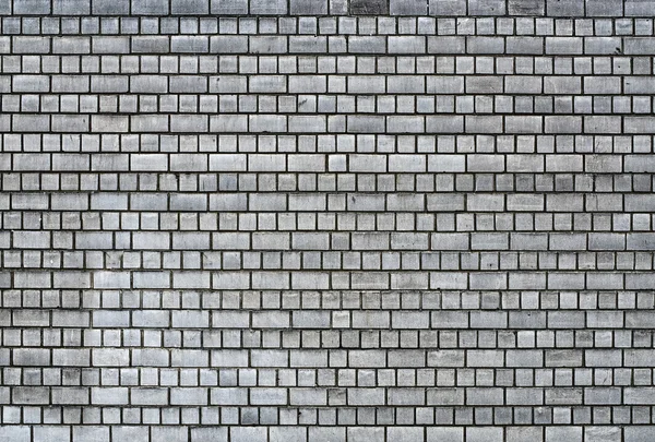 Mörk grå brickwall yta — Stockfoto