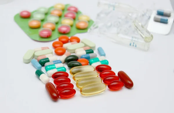 Macro of pills on white background — Stock Photo, Image