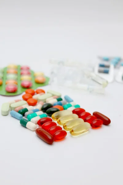 Macro of pills on white background — Stock Photo, Image