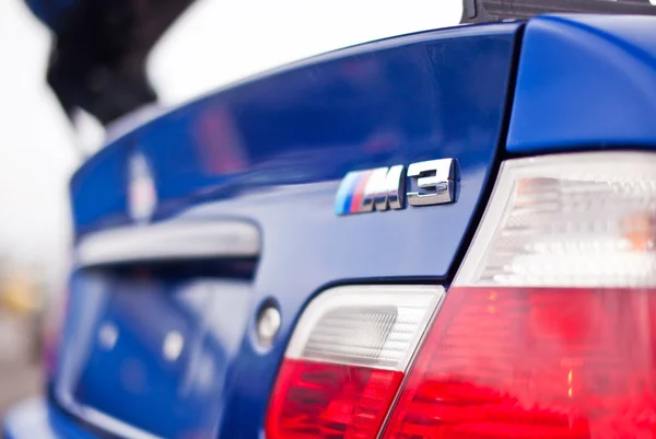 Close-up chome BMW M3 logo