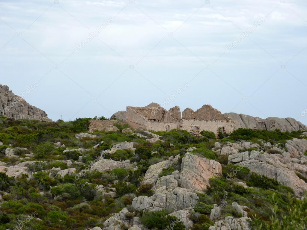 Destroyed stone buildings, Caprera island, archipelago of La Maddalena, Sardinia, Italy