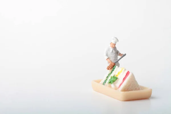 Miniature Figurine Cook Preparing Giant Club Sandwich — Stock Photo, Image