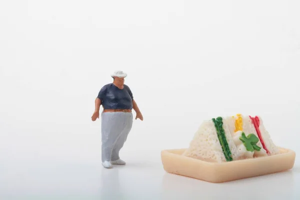 Miniatuur Beeldje Van Een Dikke Man Met Een Gigantische Sandwich — Stockfoto