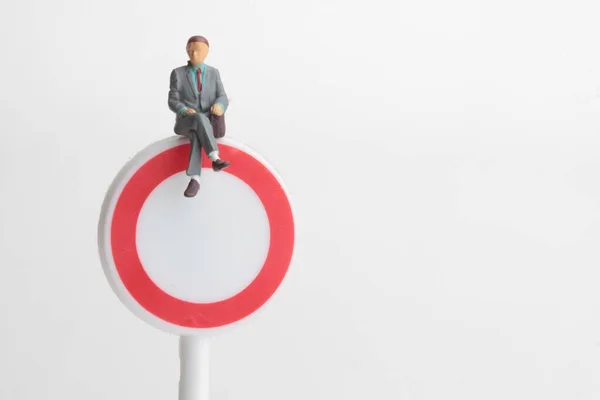 Miniature Figurine Business Man Sitting Denied Access Sign — Foto Stock