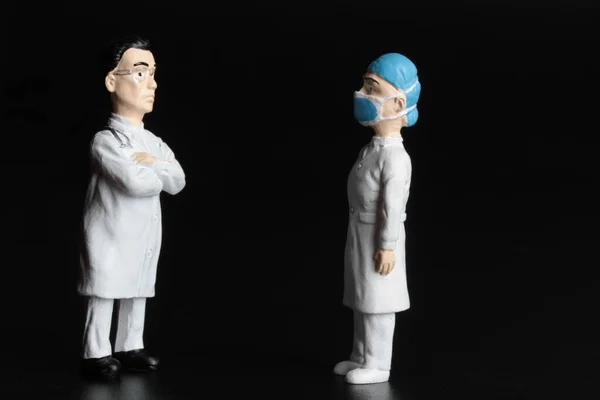 Miniature Figurines Nurse Doctor Black Background — Fotografia de Stock