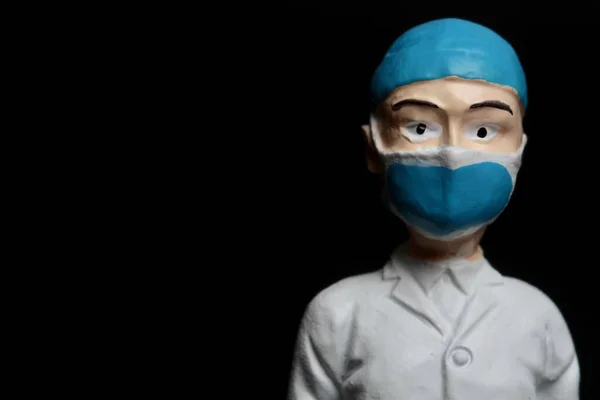 Portrait Miniature Doctor Medical Mask Isolated Black Background — Fotografia de Stock