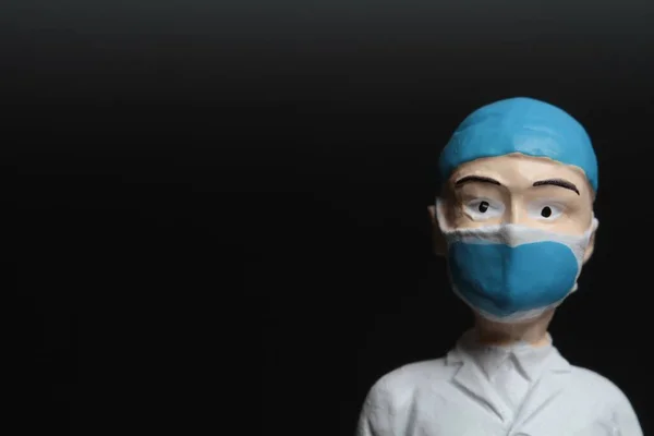Portrait Miniature Doctor Medical Mask Isolated Black Background — Stok fotoğraf