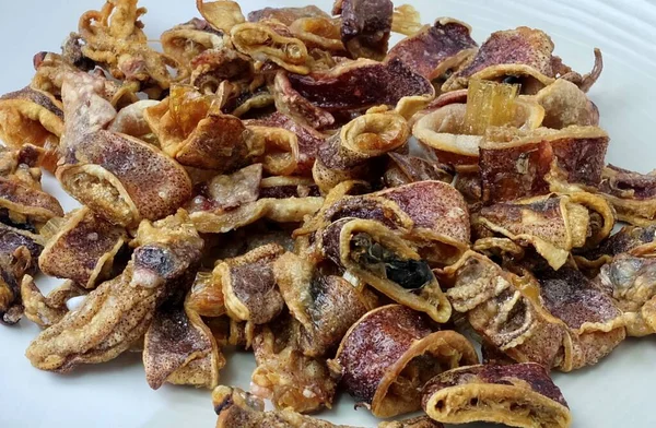 Cuisine and Food, Deep Fried Salty Squid or Octopus Made of Squid and Salted and Dried by The Sun and Wind. One of The Most Popular Snack in Asia.