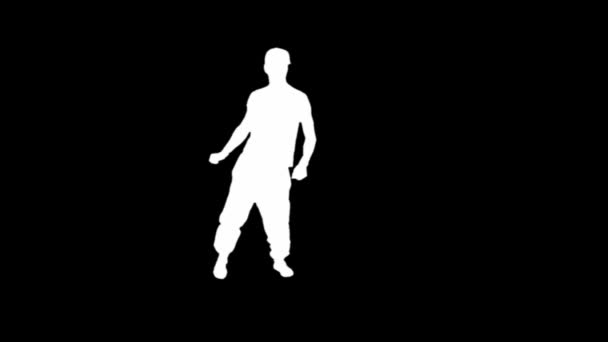 Silhouette of a young man breakdancing — Stock Video