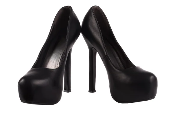 Högklackade svarta skor — Stockfoto