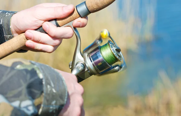 Fisherman hands — Stock Photo, Image