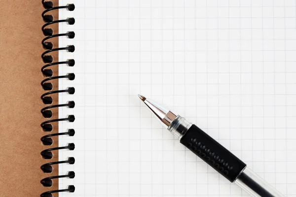 Spiral notebook and pen — Stock Photo, Image