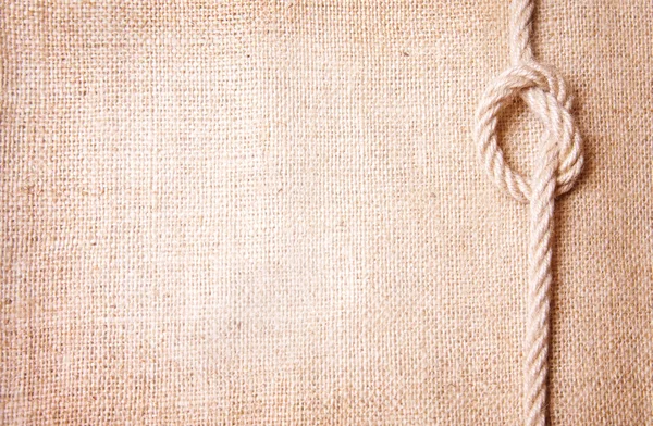 Old burlap and knot — Stock Photo, Image