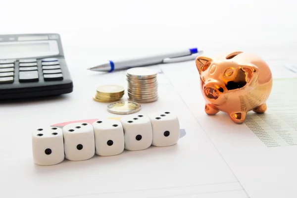 Dices, piggybank, coins stack on business background — Stock Photo, Image