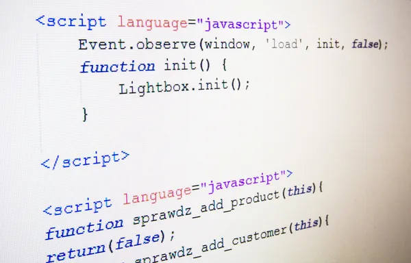 Code van javascript-taal op LCD-scherm — Stockfoto