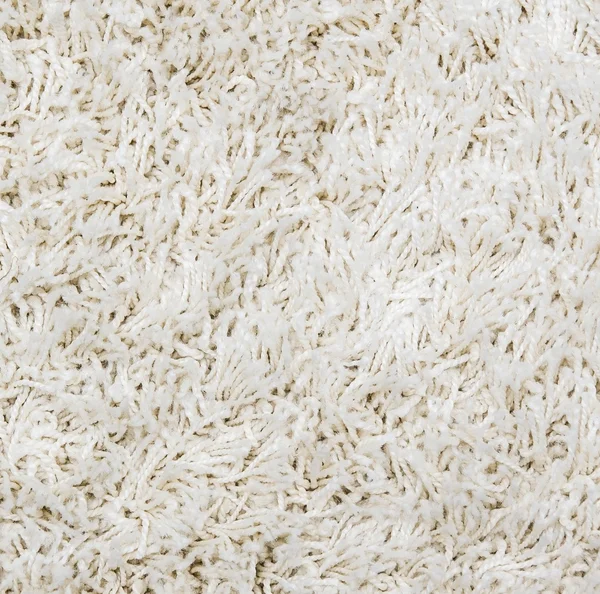 Witte shaggy tapijt achtergrond — Stockfoto