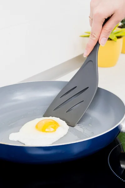 Salted egg in a frying pan — Stock Photo, Image