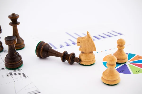Chess pieces on business background. Company strategic behavior — Stock Photo, Image