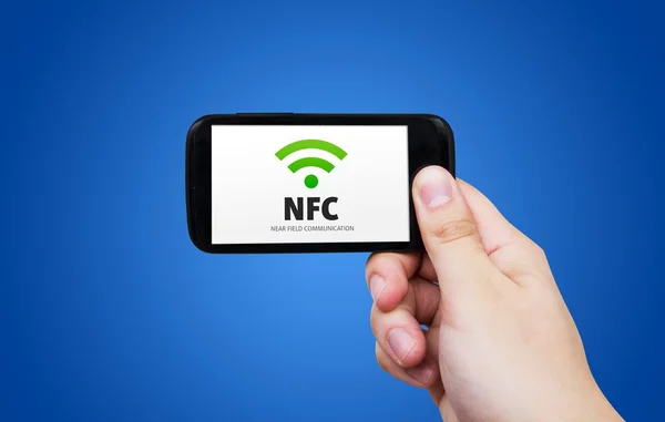 Коммуникация вблизи поля. Технология банковских платежей NFC — стоковое фото