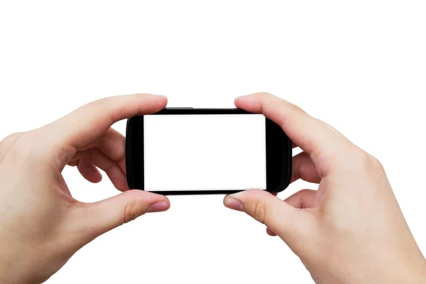 Mano sosteniendo el teléfono móvil. Smartphone con pantalla en blanco —  Fotos de Stock