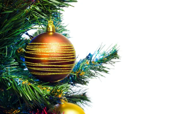 Closeup of christmas tree with bauble — Stock Photo, Image