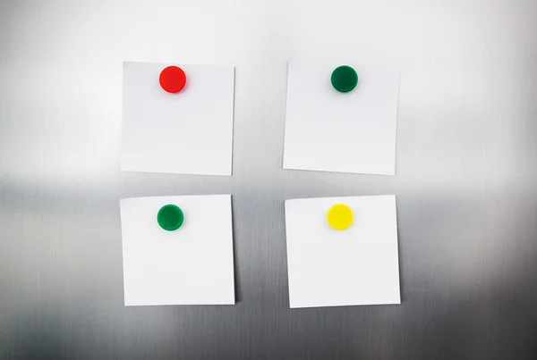 White reminders with magnets on fridge — Stock Photo, Image