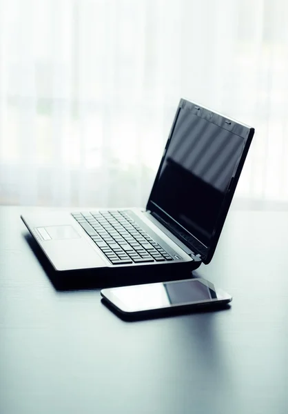 Modern laptop and tablet in office — Stock Photo, Image