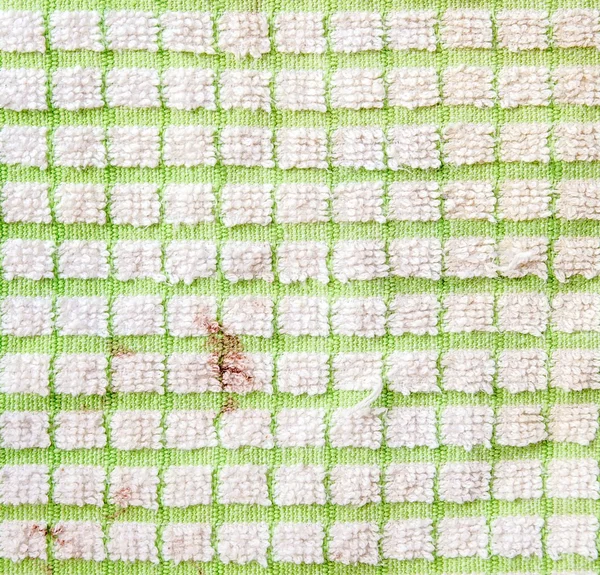 Vuile geruite groene en witte fragment van doek textuur — Stockfoto