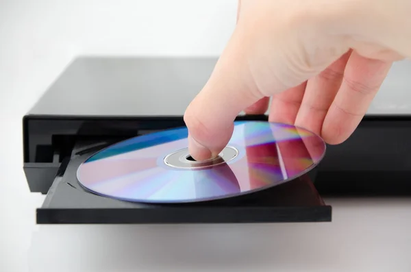 Диск, вставлений на DVD або програвач компакт-дисків — стокове фото