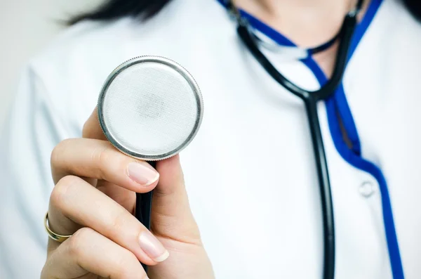 Doctor holding a stethoscope — Stock Photo, Image