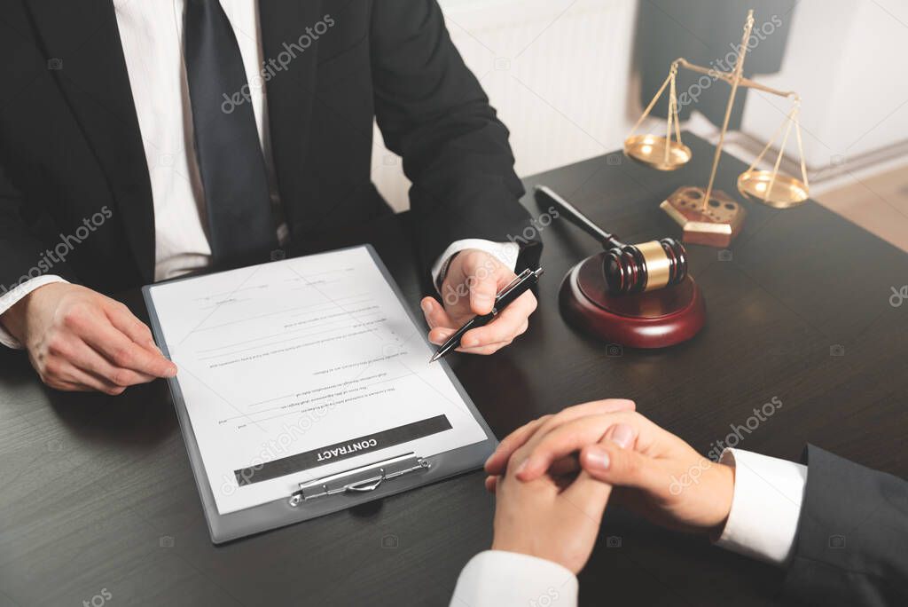 Lawyer working in his office. Law, legal concept